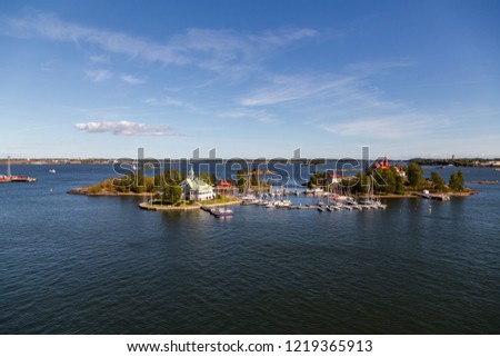 Islands of a yacht club with sailing boats on the pier outside Helsinki Finland on a sunny day