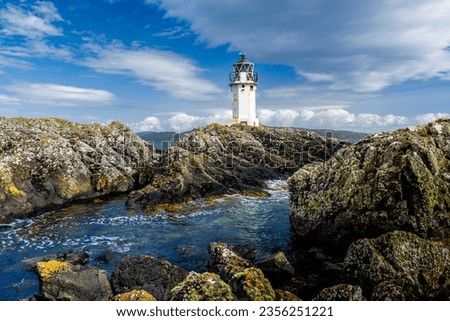 Isle of Bute, UK, July 2023, Rubh an Eun Lighthouse in Glencallum Bay