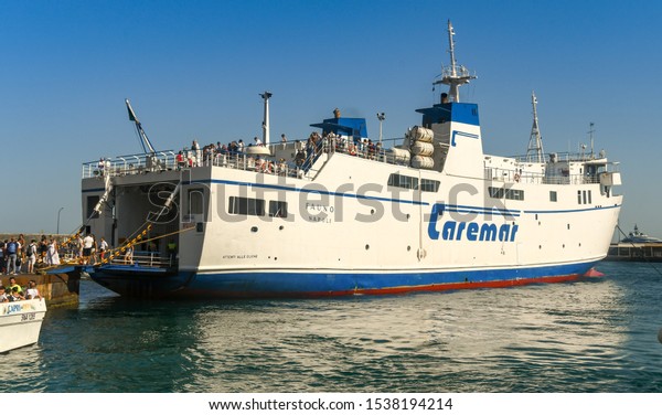 ISLE OF CAPRI,\
ITALY - AUGUST 2019: Large car ferry operated by Caremar docked in\
the port on the Isle of\
Capri.
