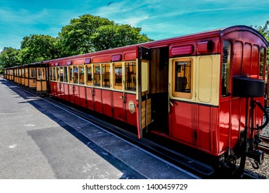 Isle Of Man, UK 6/20/2017 Holiday Makers Experiencing The Isle Of Man Vintage Railway 