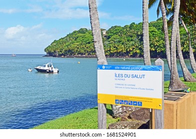 Isle Royale, French Guiana/France - March 21 2016: A Sign Welcomes Visitors To The Isles Du Salut, The Salvation Islands, Off The Coast Of French Guiana And Home To The Infamous Devils Island.