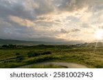 Isle of Skye landscape with dramatic sky at sunset, Scotland, UK