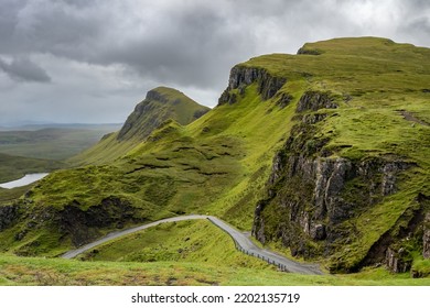 Isle Of Skyec , Scotland - August 2nd 2022 - Hiker Hiking The Quirang Trail On The Isle Of Skye During Summer