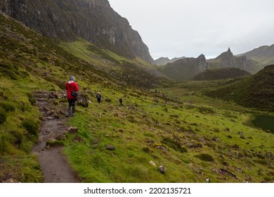 Isle Of Skyec , Scotland - August 2nd 2022 - Hiker Hiking The Quirang Trail On The Isle Of Skye During Summer