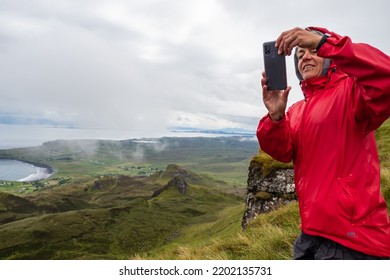 Isle Of Skyec , Scotland - August 2nd 2022 - Hiker Hiking The Quirang Trail On The Isle Of Skye During Summer