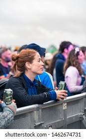 Isle Of Tiree, Argyll / UK - 07 13 2019: Close Up Of Woman In A Crowd Enjoying A Festival Music Performance In Front Of The Stage