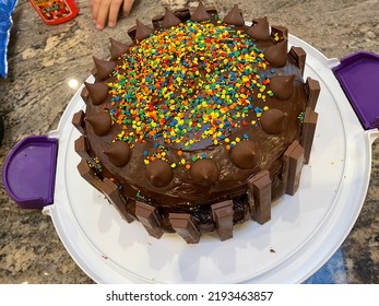 Islip Terrace, NY, USA, 8.21.22 - The Close Up View Of A Homemade Cake That Is Decorated With Kit Kats And Hersey Kisses.