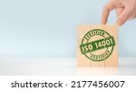 ISO 14001 certified environmental management systems. Requirements for an environmental management system for organization can use to enhance environmental performance. ISO 14001 on wooden cubes.