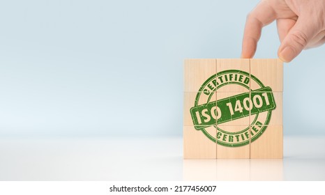 ISO 14001 Certified Environmental Management Systems. Requirements For An Environmental Management System For Organization Can Use To Enhance Environmental Performance. ISO 14001 On Wooden Cubes.