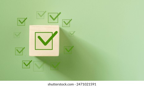 ISO 14001 quality control certification concept. wooden cubes with the abbreviation ISO with a check mark. ISO standards quality control 14001 certified for environmental management systems (EMS).