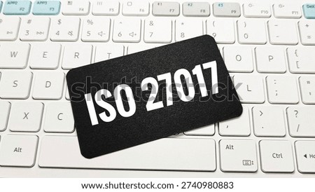 ISO 27017 cloud security standard concept with computer keyboard, representing information protection, cybersecurity compliance, risk management and governance. 