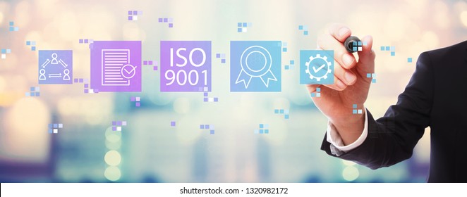ISO 9001 with businessman on blurred abstract background