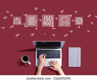 ISO 9001 Concept With Person Using A Laptop Computer