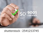 ISO 9001 Standard certification standardisation quality control concept, businessman choose ISO 9001 icons for certified and quality management of organizations.