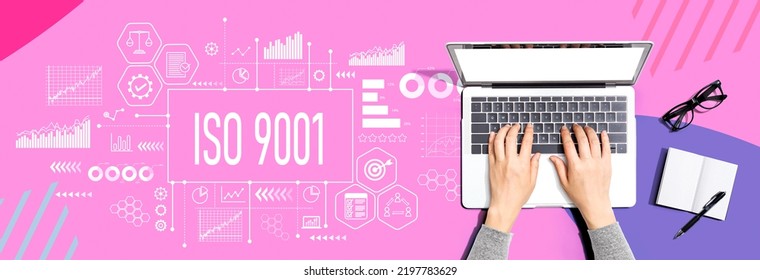 ISO 9001 Theme With Person Using A Laptop Computer