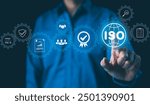 ISO Certification Concept. Businessman touch representation of ISO certification, icons symbolizing quality assurance, compliance, global standards, and International organization for standardization.