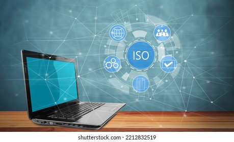 ISO With Icons And Laptop On The Table