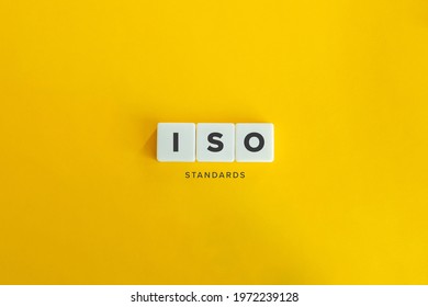 ISO standards banner and concept. Block letters on bright orange background. Minimal aesthetics.