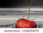  Isolate macro of red cherry with water