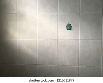 Isolate Plastic Hook On Tile Wall Background