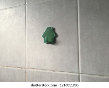 Isolate Plastic Hook On Tile Wall Background