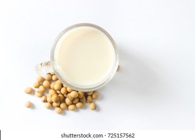 Isolate soy milk and beans on white background.The best meal for vegan. In the vegetarian festival are coming soy beans were the best food for everyone.