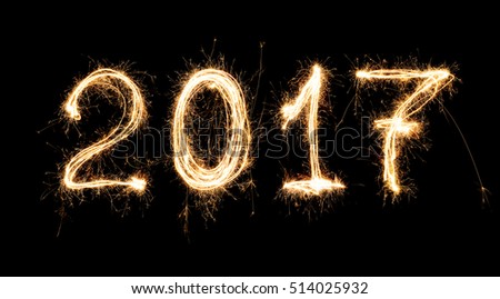 isolated 2017 written with Sparkle firework on black background , 2017 Happy New Year background concept.
