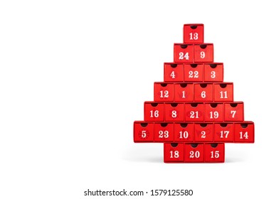 Isolated Advent Calendar.  Red Christmas Tree Made Out Of Cardboard With White Numbers. All Numbers Visible. 