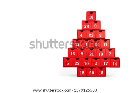 Isolated advent calendar.  Red Christmas tree made out of cardboard with white numbers. All numbers visible. 