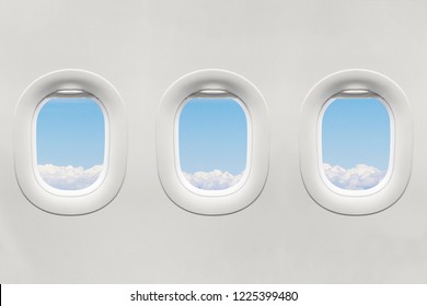 Isolated Airplane Window With Blue Sky From Customer Seat View