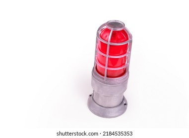 Isolated Alarm Siren With Red Glow. Perspective View Of An Emergency Caution Warning Light Or Beacon Flashing Light With Metal Base. Copy Space. Selective Focus.