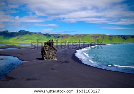 The Isolated Arnardrangur Eagle Rock on Reynisfjara Black Sand Beach Near Dyrhólaey and Vik on Iceland's Southern Coast