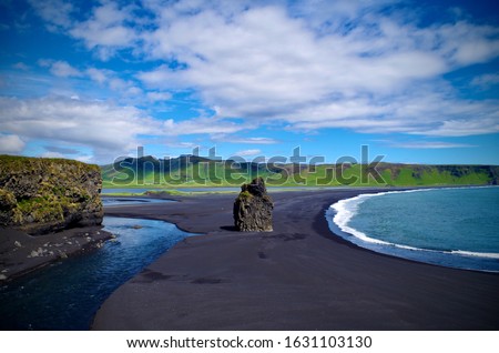 The Isolated Arnardrangur Eagle Rock on Reynisfjara Black Sand Beach Near Dyrhólaey and Vik on Iceland's Southern Coast