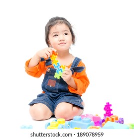 Isolated Asian Kid Girl Playing With Toys , White Background