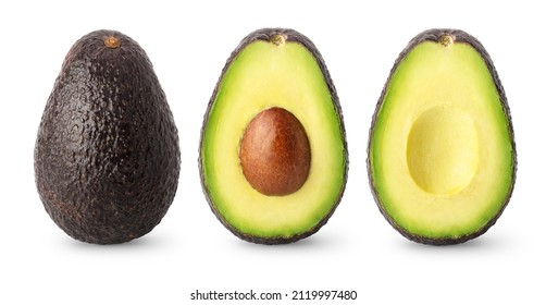 Isolated avocados. Whole black avocado fruit, half with seed and a half without isolated on white background with clipping path