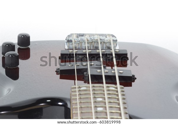 isolated for bass guitar in burn
texture four strings are instrument to play the music and song for
education and relaxing in vacation and display  for learning
