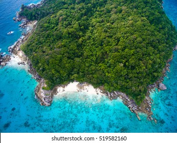 Isolated Beautiful Tropical Island With White Sand Beach And Blue Clear Water And Granite Stones. Top View, Speedboats Above Coral Reef. Similan Islands, Thailand.