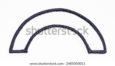Isolated blank white patch with black trim.