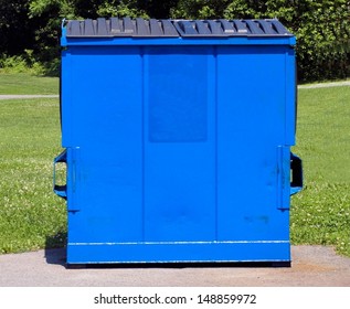 Isolated Blue Dumpster