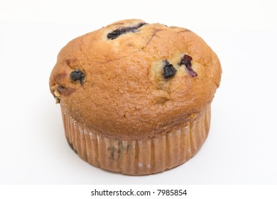 Isolated Blueberry And Cranberry Muffin On White Background.