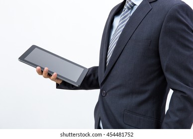 isolated business man hold the tablet on white background
