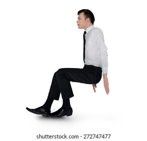 Isolated business man push something