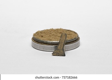 Isolated Cannabis Kief In A White Background