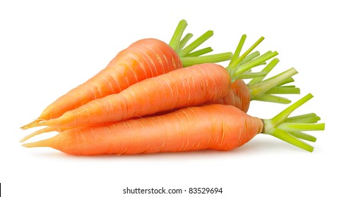 Isolated carrots. Heap of fresh carrots with stems isolated on white background