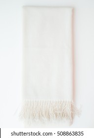 isolated cashmere scarf on white background - studio shot from above