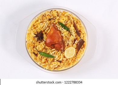 Isolated Chicken Biryani, Top View Of Traditional Indian Food, Spicy Fried Rice, Ramadan Iftar Meal, Eid Dinner On White Background.