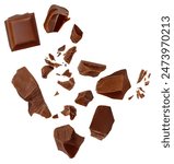 Isolated Chocolate bar pieces falling on white background. Milk Chocolate explosion with  cocoa crumbs and shavings,  Top view. Flat lay. Pattern
