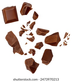 Isolated Chocolate bar pieces falling on white background. Milk Chocolate explosion with  cocoa crumbs and shavings,  Top view. Flat lay. Pattern
