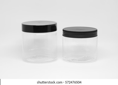 Isolated Clear Plastic Jar With Black Lid