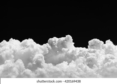 Isolated Clouds Over Black